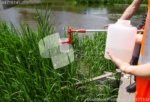 Image of Take samples of water for laboratory testing. The concept - anal