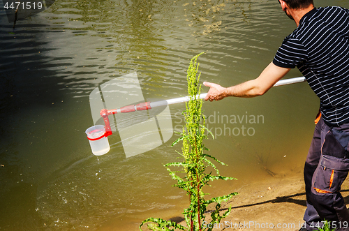 Image of Take samples of water for laboratory testing. The concept - anal