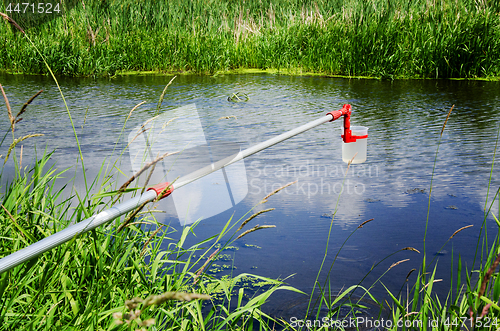 Image of Take samples of water for laboratory testing. The concept - anal