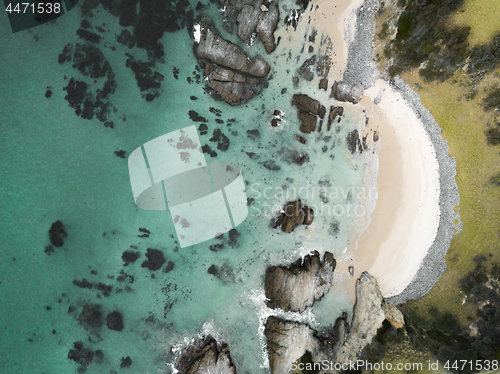 Image of Aerial view of idyllic arc beach with pristine waters