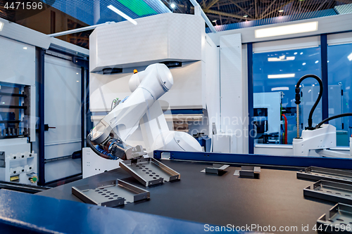 Image of Robotic Arm modern industrial technology. Automated production c