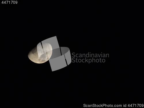 Image of Gibbous Moon Isolated Against Black Night Sky