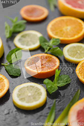 Image of close up of grapefruit, orange, pomelo and lime