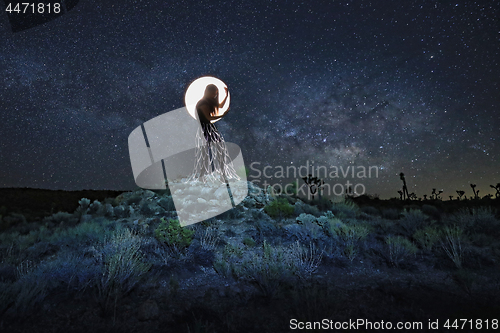 Image of Girl Light Painted Under the Milky Way