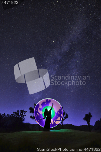 Image of Girl Light Painted Under the Milky Way