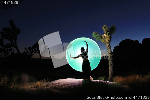 Image of Girl Light Painted Under the Milky Way