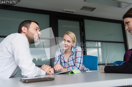 Image of Business Team At A Meeting at modern office building