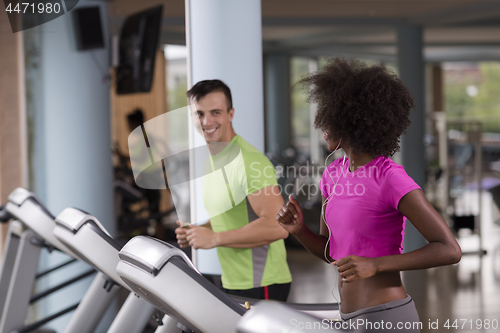 Image of people exercisinng a cardio on treadmill