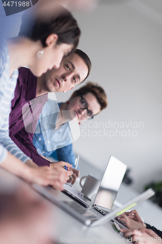 Image of Group of young people meeting in startup office