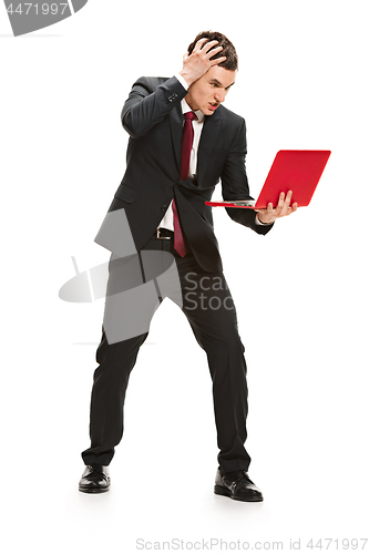 Image of Full body portrait of businessman with laptop on white