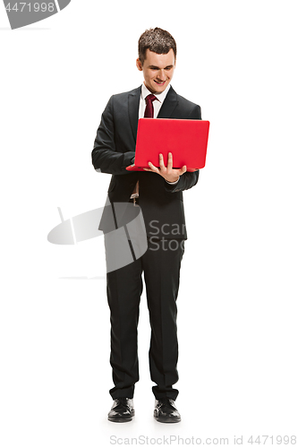 Image of Full body portrait of businessman with laptop on white