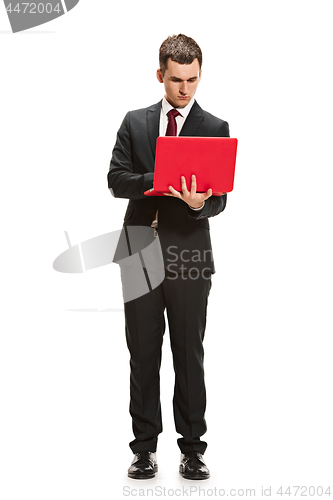 Image of Full body portrait of businessman with laptop on white