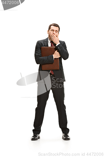 Image of Full body portrait of businessman with folder on white