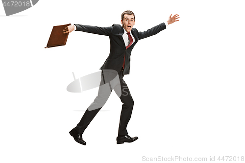 Image of Funny cheerful businessman over white background