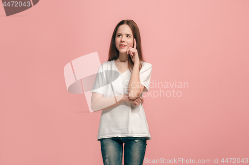 Image of Young serious thoughtful teen girl. Doubt concept.