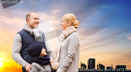 Image of happy family over sunset in evening tallinn city