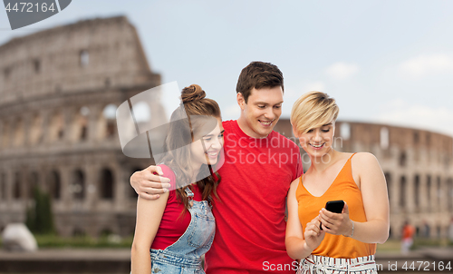 Image of friends with smartphone over coliseum background