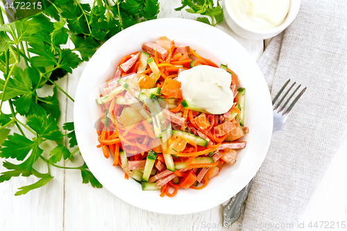 Image of Salad of sausage and spicy carrots on board top