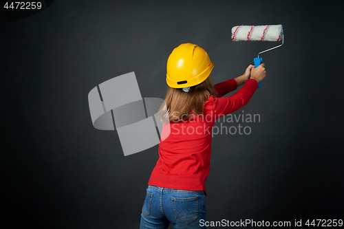 Image of Decoration, renovation and reconstrucion concept. Painting girl