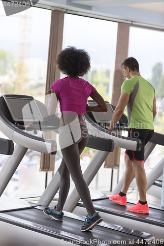 Image of people exercisinng a cardio on treadmill