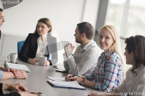 Image of Group of young people meeting in startup office