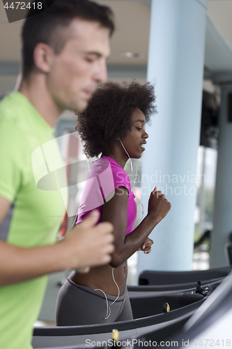 Image of people exercisinng a cardio on treadmill