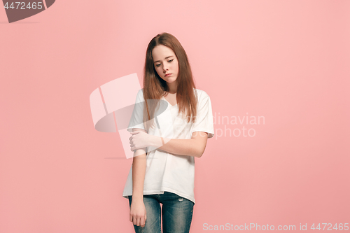 Image of Young serious thoughtful sad teen girl