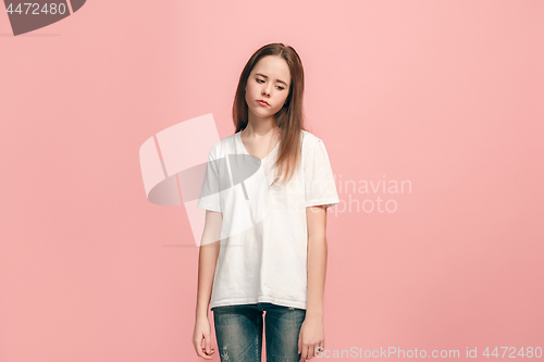 Image of Young serious thoughtful sad teen girl