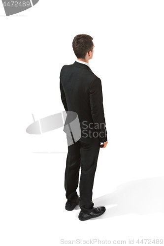 Image of Back view of a businessman. Confident professional in suit