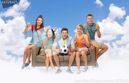 Image of friends or soccer fans with ball and drinks in sky