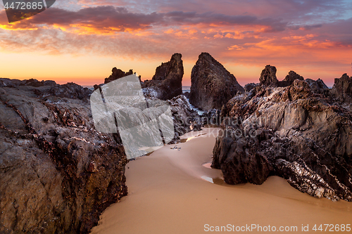 Image of Ocean sunrise with craggy rock channels near Narooma