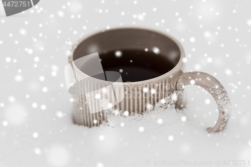 Image of tea or coffee mug in snow