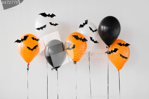 Image of halloween party balloons with black bats