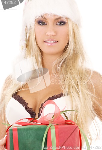 Image of santa helper girl in white lingerie with gift box