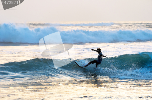 Image of Man surf in the ocean