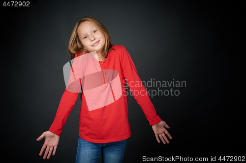 Image of Little girl shrugging her shoulders
