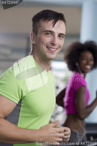 Image of people exercisinng a cardio on treadmill