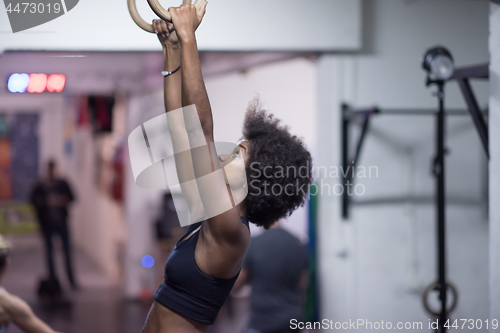 Image of black woman doing dipping exercise