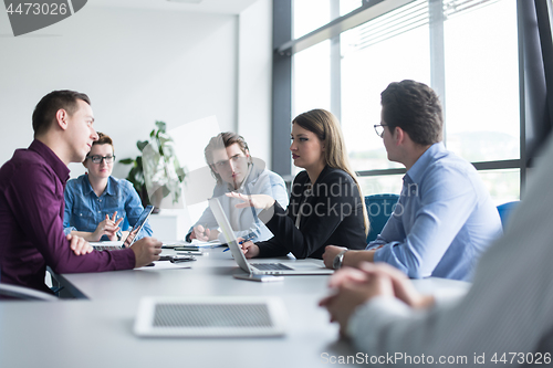 Image of Business Team At A Meeting at modern office building