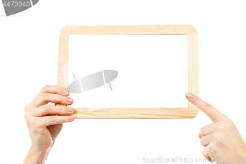 Image of woman\'s hands holding a blackboard publicity