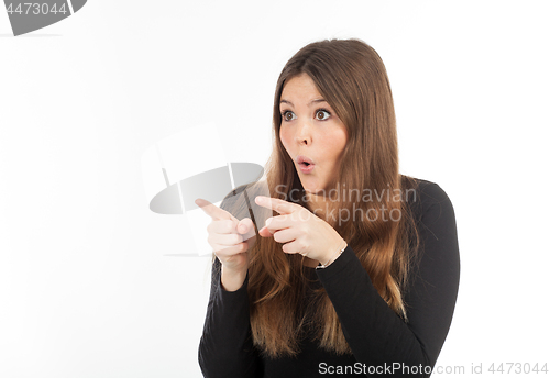 Image of Beautiful young woman showing blank signboard