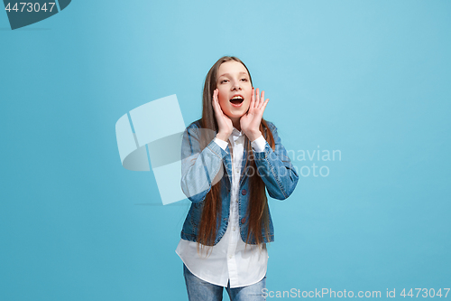 Image of Isolated on pink young casual teen girl shouting at studio