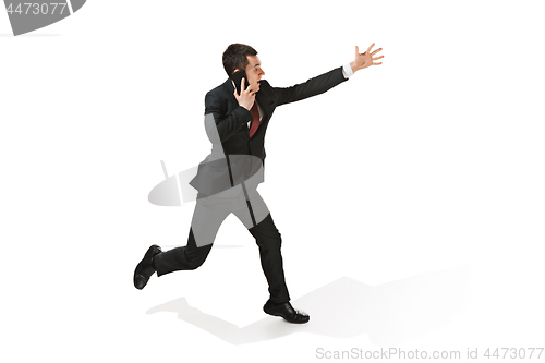 Image of Funny cheerful businessman over white background