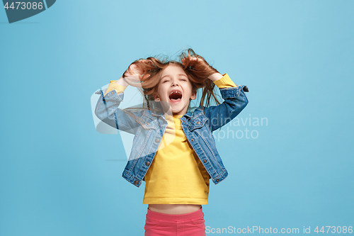 Image of The squint eyed teen girl with weird expression