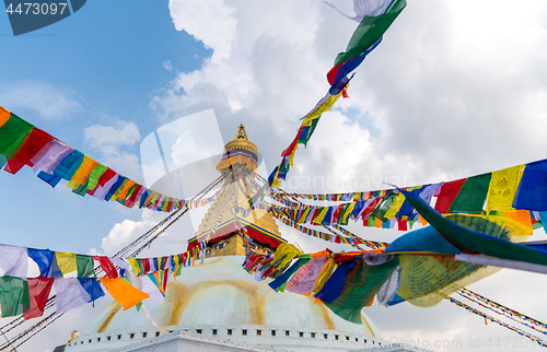 Image of Boudhanath Stupa and prayer flags in Kathmandu