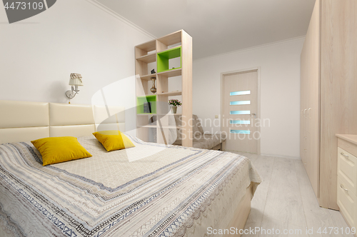 Image of Bedroom interior with large double bed