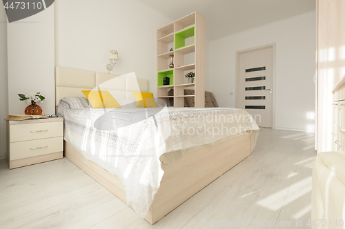 Image of Bedroom interior with large double bed