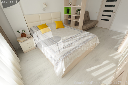 Image of Bedroom interior with large double bed