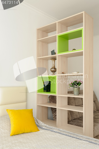 Image of Bedroom interior with bookshelf