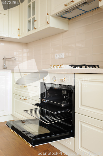 Image of Classic cream colored kitchen